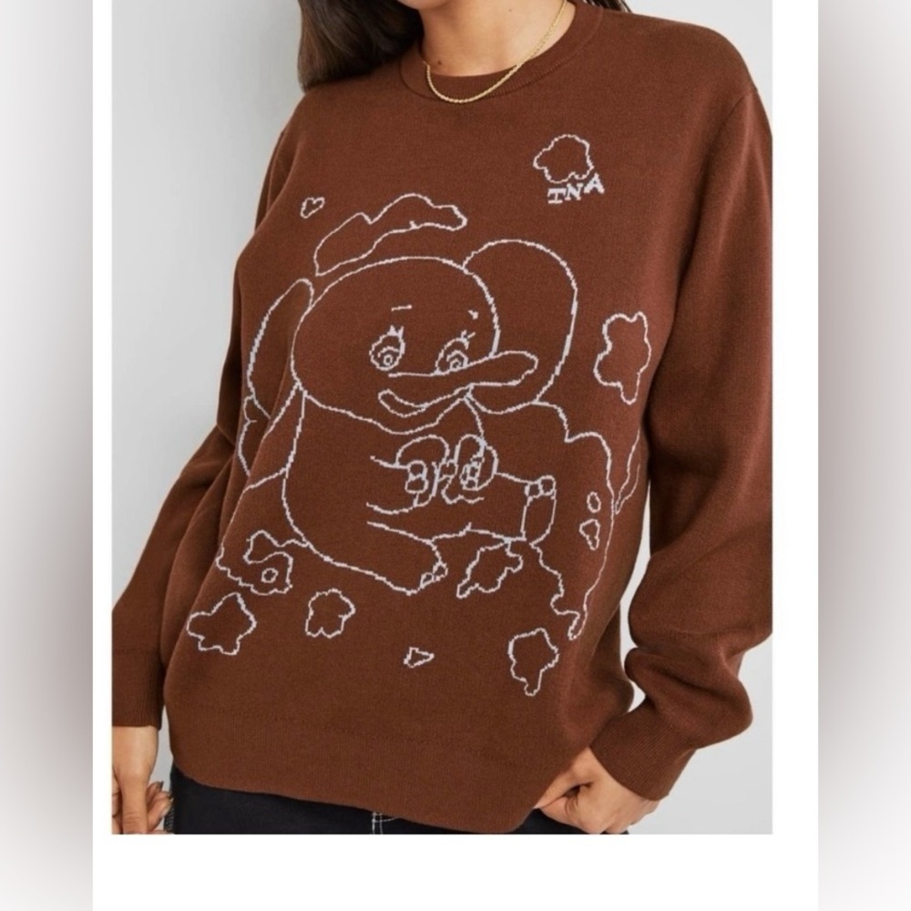 TNA Crewneck sweater.